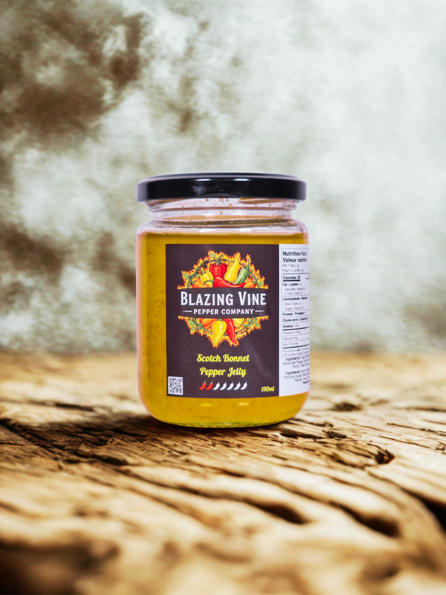 Blazing Vine Scotch Bonnet Pepper Jelly — golden yellow-green jelly in a glass jar